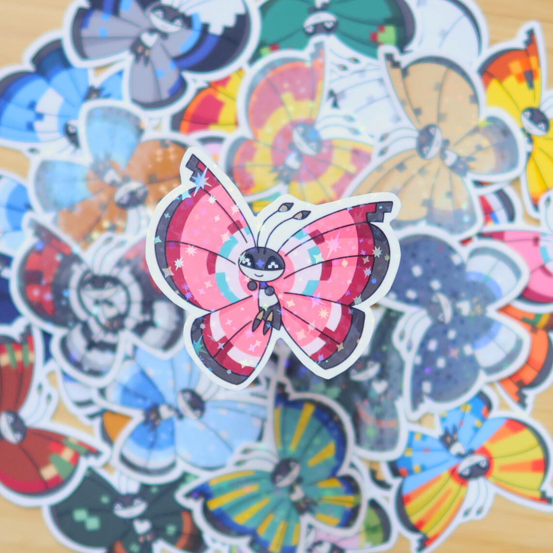 Fényes Vivillon fényes hologramos matrica 400 HUF / 1.50 EUR